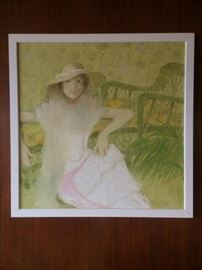 Portrait of a woman in a hat and boa. Signed Lili