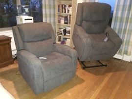 Pair of lift assist chairs in grey microsuede.