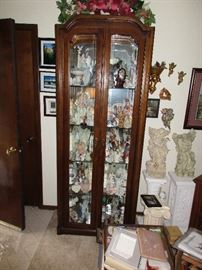 CURIO CABINET WITH ANGLES