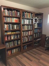 Great selection of antique and new books - fiction, Methodist theology, Bibles, American Indian history, children's books including a collection of Hardy Boys books. The book shelves are also for sale. The picture shows three sections but there are actually four sections. Great solid wood bookcases.