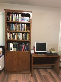 Bookshelf with cabinet. Also part of a sectional desk.