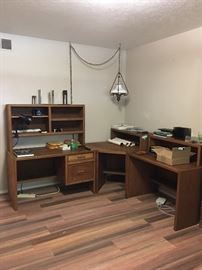 Sectional Desk and swag lamp.