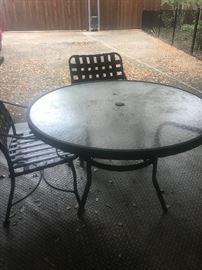 patio table and two chairs
