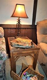 Two matching wicker end tables with matching lamps and shades; glass tops.  Very good condition.