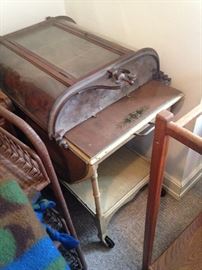 ANTIQUE WALL SHELF AND UNDERNEATH IS VINTAGE TEA CART