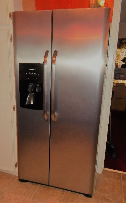 Frigidaire side-by-side refrigerator - less than 2 years old
