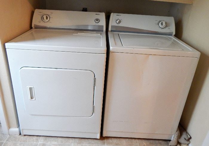Amana washer and dryer. Washer has some cosmetic damage, but works good.