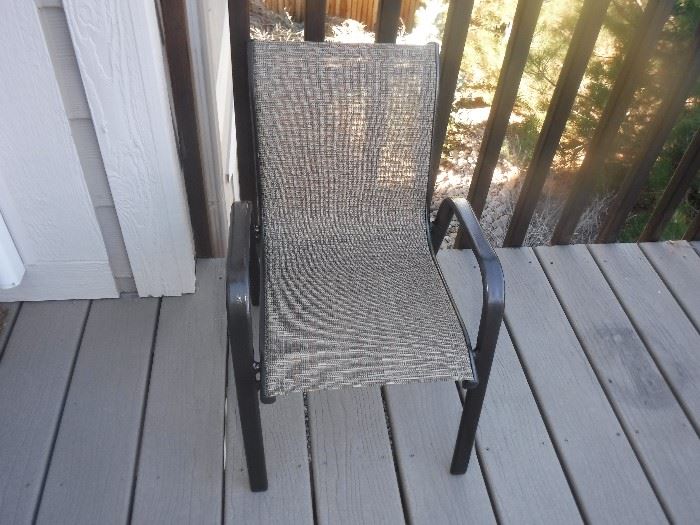 CHAIR FOR TABLE ON LOWER PATIO.