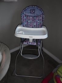 NICE COMPACT HIGH CHAIR. PERFECT FOR GRANDMA'S HOUSE.