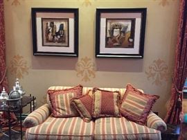 2 signed and numbered prints in custom frames