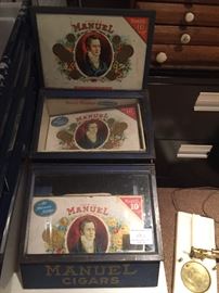 Assortment of antique cigar collectibles. 