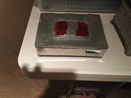 Assortment of antique cigar collectibles. 