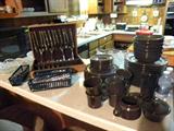 Several sets of everyday China, Cabinets FULL of Corning Ware many w/
covered glass tops, etc....Pyrex, Glassware, Relish Dishes, Kitchen Utensils, Mixer, Waffle Iron, Crock Pot, Tupperware, Cast Iron, Pots/Pans, Microwave, New Coffee Maker, Toaster, Blender, Oneida S/S
flatware., "New" boxses of Kitchen Knife Collections, Toast Master Small Oven, Center Working Wood Island w/loaded storage
cabinets, etc., etc., etc....