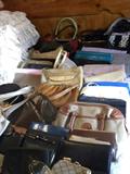 Assorted handbags, purse, wallets, etc. All brand names.