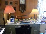 Assorted office supplies, boxes of Birthday, Get Well, Wedding Cards...
Lamps, Metal Desk, File Cabinets, Small file cabinet on wheels.
Several wall clocks and assorted wall decorations....