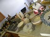 Tables full of kitchen items, dishes, glassware, pots/pans, pyrex, corning ware of all sizes, vintage metal cake cover, Lots of John Deere tableware, accessories......Jello metal molds, lots and lots of tupperware, Vintage
appliances..Cookbooks....Something for everyone...