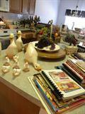 Lots of Cookbooks...Lazy Susan....Duck/Ceramic Set, Fruit Arrangement,
Salt/Pepper Sets, Dinnerware, Collection of Coffee Mugs..