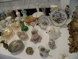Tables full of glassware, decorator items, collections from travels, etc..