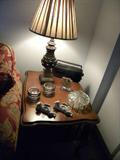Several small electronics, coasters, decorator items...Lamps, framed
pictures, books, cd's, tapes, etc.., etc....