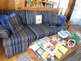 Upholstered Den Sofa with Maple Coffeetable.  CookBooks located on coffeetable...accessories...

Don't forget to go outside to the Workshop, tools, boxes of holiday items, etc...Something for everyone.. and outside patio set, chairs, yard artwork.