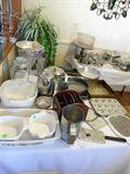 Tables full of kitchen items, corningware, pyrex, pots, pans, coffee maker,
dishes, etc...