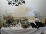 More items in kitchen:  pots/pans, canisters, mixer, small appliances, small crock pot..
