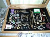 Several cases of vintage costume jewelry and some sterling pins, etc...