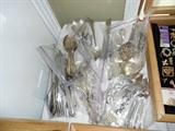 Lots of beautiful silver-plated spoons, a collection that dates back to the early 1900's....Sterling and sterling salt/pepper/compote/baby cups, etc...