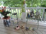 Back covered porch is full of outdoor artwork...Come find your treasure...