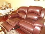 As seen Leather LoveSeat....located in the den area..