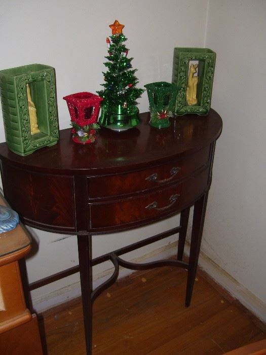 Mahogany half table with some vintage christmas.