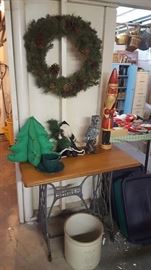 Singer stand, OLD carved Santa and another Western Crock
