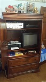 Computer armoire or sweater holder or stuff hider....