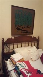 Twin bed and some cool wall art