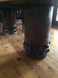 Post legs on table our from Antique grain mill This table is one of a kind