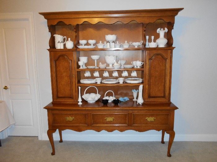 Maple hutch.  Collectible Fenton, Westmoreland milk glass and other milk glass pieces.