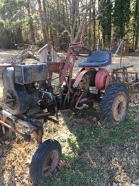 old yard art tractor