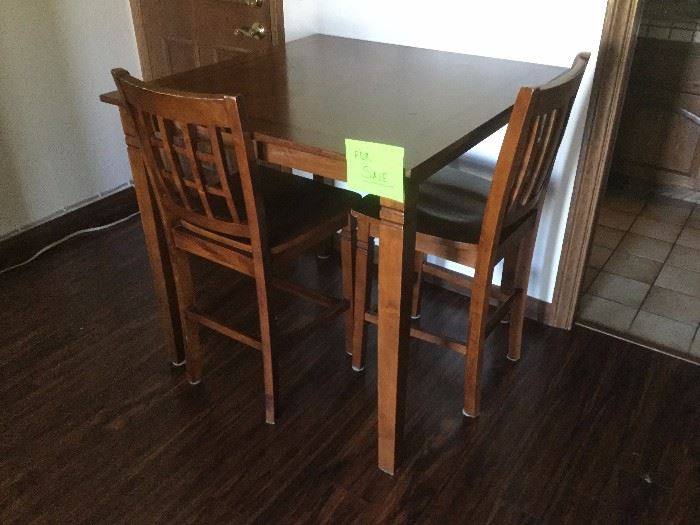  bar style table and two chairs $95