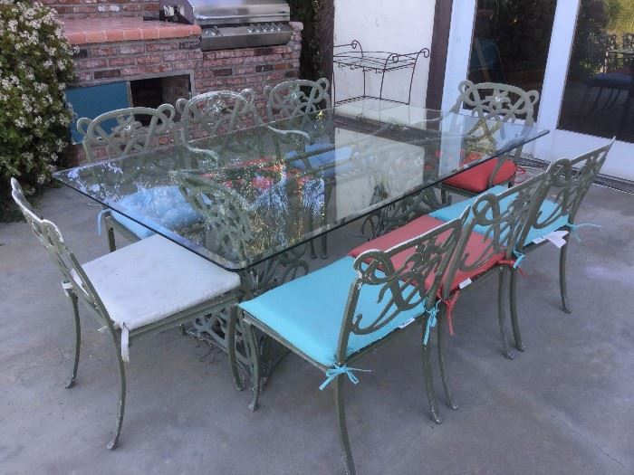  glass top patio  table and eight chairs $175