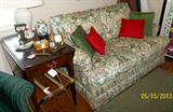Love seat and Pembroke drop leaf side table and cute small luggage stand. Decorator pillows go with sofa.