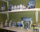 This precious lady loves blue and white! A dedicated collector! Items are matching shaker cellars (12), beautiful fish vase, etc., etc.......
