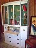 Painted breakfront with pull-out desk drawer and plenty of storage.