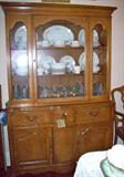 Front view of china cabinet of Bassett dining room suite.