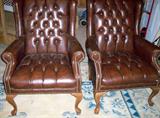 Pair of very nice leather-ish wing chairs! Rich, chocolate brown and in good condition.