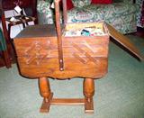 Don't see many of these anymore....an expanding sewing chest....still stocked! Nice finish! Can be used as a chairside table!