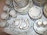 Very attractive blue, gray and white pattern with serving pieces - platters, vegetable bowl cream & sugar and salt & pepper PLUS soup bowls!
