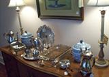 Beautiful buffet with very pretty buffet lamps and nice, silver-plate serving pieces.