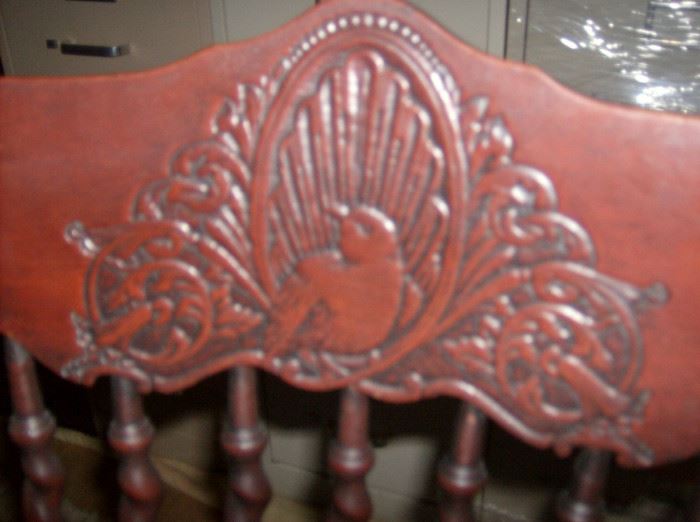 Rocking chair header carved detail 