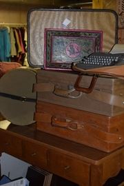 Hartmann Luggage and fun hat box on the left.