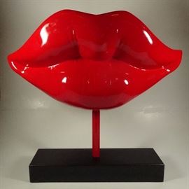 LARGE RED LIPS SCULPTURE ON BLACK GRANITE BASE, FIBERGLASS COMPOSITION IN LIPSTICK RED